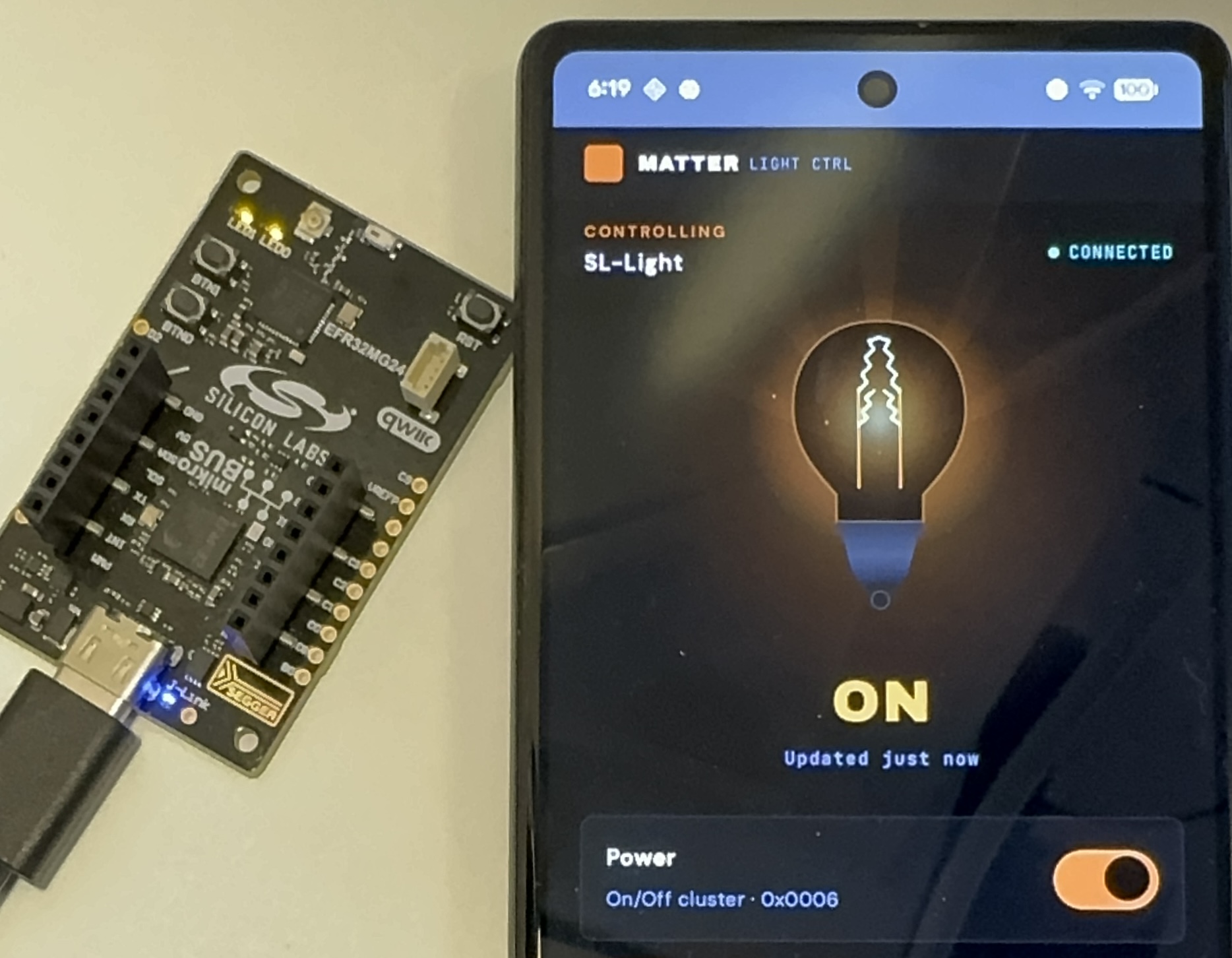 Matter smart home setup with xG24 board as a light bulb and Android phone running the Matter control app