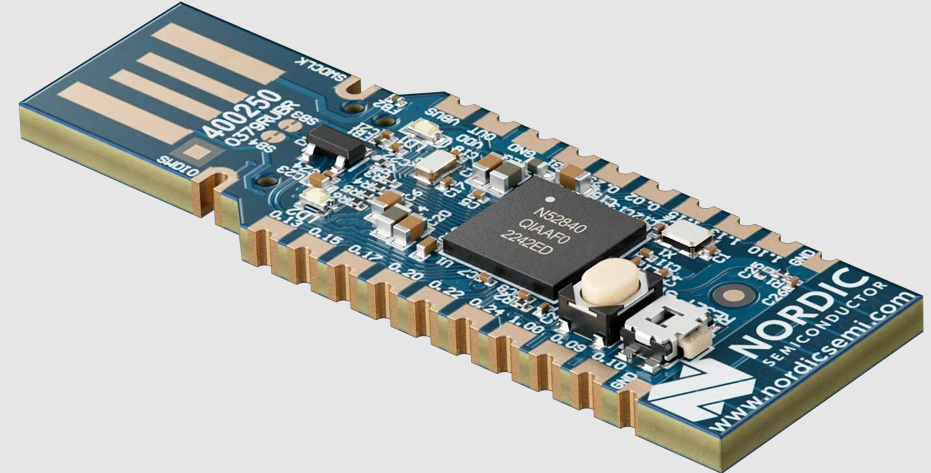 Nordic nRF52840 USB dongle used as a Bluetooth beacon in the testbed